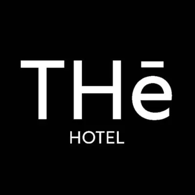 a close up of a hotel sign with the word at THE HOTEL in Cordoba