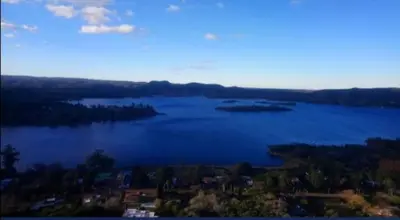 a large body of blue water with islands in it at Casa el sueño de Alicia in Villa del Dique