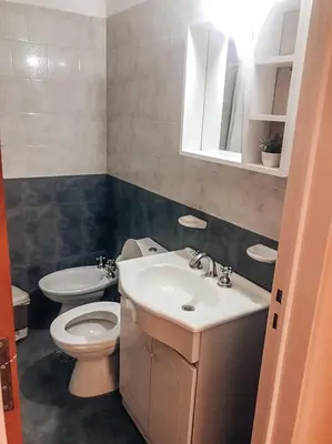 a bathroom with a sink and a toilet at Departamento en la mejor zona de GENERAL PAZ in Cordoba