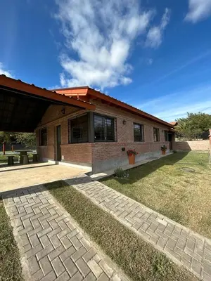 a brick house with a pathway in front of it at MORADA DEL ZORRO in Merlo