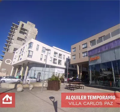 a group of buildings on a city street at Departamento centrico Carlos Paz in Villa Carlos Paz