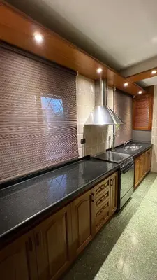 a kitchen with a counter top and a window at Verona in Cordoba