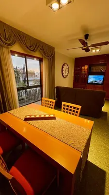 a living room with a table and a couch at Verona in Cordoba