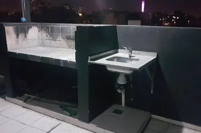 a bathroom with a sink in a room with a window at LOAN Nueva Cordoba 3i in Cordoba