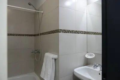 a bathroom with a shower and a sink at LOAN Nueva Cordoba 3i in Cordoba