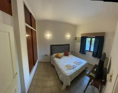 a small bedroom with a bed in a room at Apartamento Nuevo Centro in Cordoba
