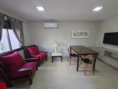 a living room with a couch and a table at COMPLEJO CRUZ in Alta Gracia