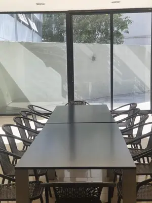 a table and chairs in front of a window at LOCADOR Nueva Cordoba 3C in Cordoba