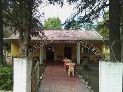 an entrance to a house with a brick walkway at Posada Tanti El Durazno in Tanti