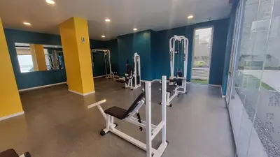 a gym with several tread machines in a room at PISO TRES. Depto de categoría en cofico. C/Cochera in Cordoba