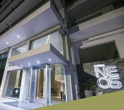 a building with a msg sign on the front of it at Departamento a estrenar con piscina con cochera opcional in Río Cuarto