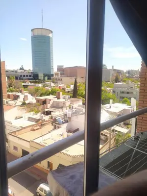 a view of a city from a window at Departamento zona Nuevocentro Shopping in Cordoba