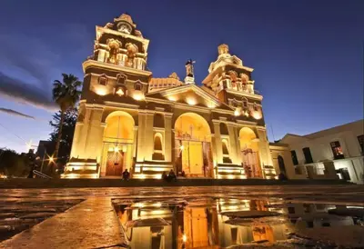 a large building with lights in front of it at Coral State Loft in Tower in Cordoba