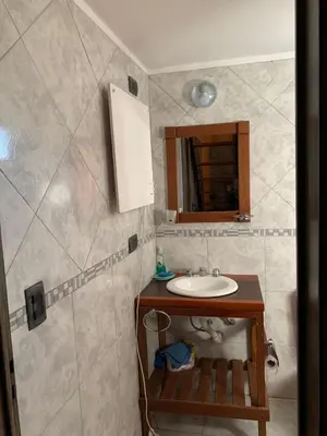 a bathroom with a sink and a mirror at Malenka in Pantanillo
