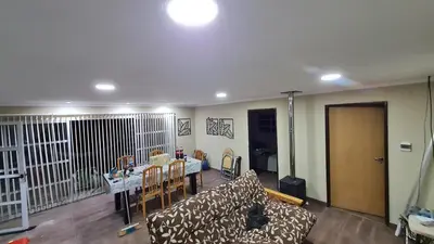 a living room with a couch and a table at Aromas serranos in Villa Rumipal