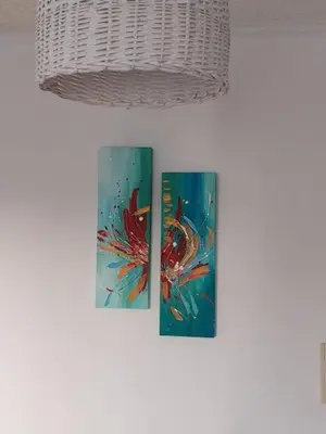 two paintings of a fish on a wall at Departamento nuevo en Cordoba in Cordoba