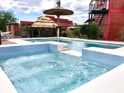 a large swimming pool with a large swimming pool at LA MILAGROS ZORZAL COLORADO in Merlo