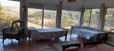 a room with a large window with a view at Casa Desconectar in Villa Berna