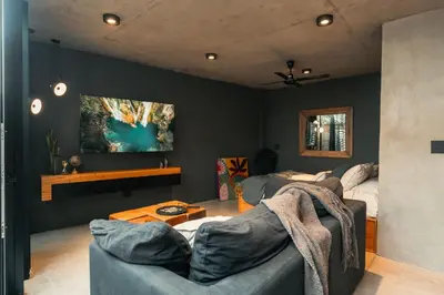 a living room with a couch and a table at Loft 1930 in Villa Carlos Paz