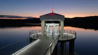 a gazebo on a dock on a lake at Hotel La Huertita in Libertador General San Martín