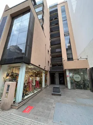 a store front of a tall building with a store window at Castel Di Lucio 6 - Pleno centro Cba - in Cordoba