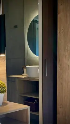 a bathroom with a sink and a mirror at Agrippina in Villa Carlos Paz