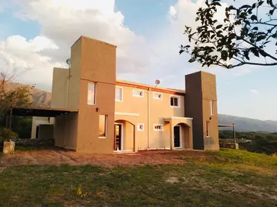 a house on top of a hill at Mirador Merlo in Merlo