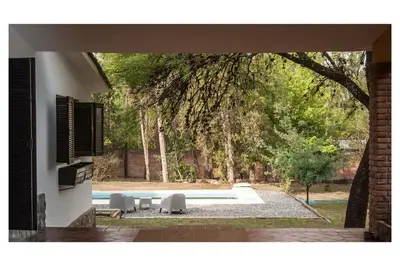 a view of a swimming pool from a house at VILLA BEATRIZ in Villa Anizacate