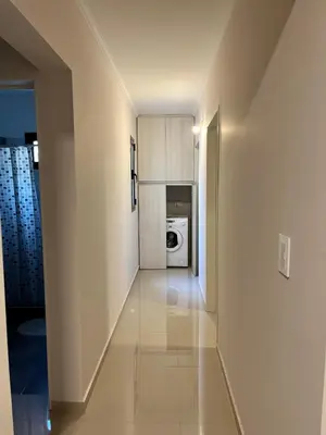 a hallway leading to a kitchen in a house at Depto Tatiana zona céntrica Carlos Paz in Villa Carlos Paz