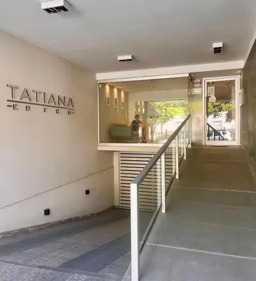a building with a staircase and a sign that reads talma hotel at Depto Tatiana zona céntrica Carlos Paz in Villa Carlos Paz