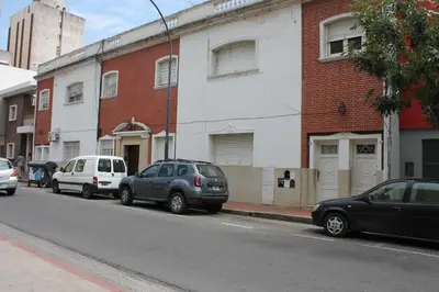a group of cars parked on the side of a street at Departamento Santa Rosa in Cordoba