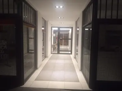 an empty hallway with a door in a building at Tranquilidad, privacidad y relax in Cordoba