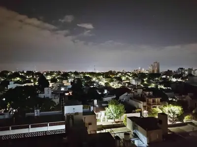 a view of a city at night at Tranquilidad, privacidad y relax in Cordoba