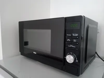 a microwave oven sitting on top of a counter at Tranquilidad, privacidad y relax in Cordoba
