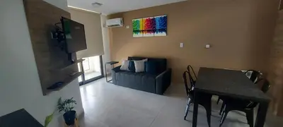 a living room with a table and a couch at Centro Carlos Paz 1 dormitorio in Villa Carlos Paz