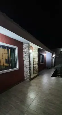 an empty hallway of a building at night at La Estancita de Tanti con pileta in Tanti