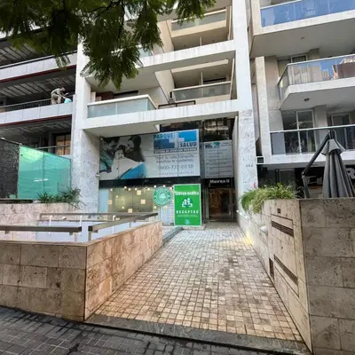 a building with a sign in front of it at Mairea II bis in Cordoba