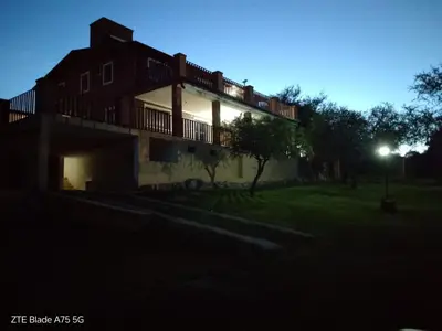 a house at night with a street light at RESIDENCIA EL TALA in Cordoba