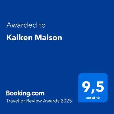 a blue phone screen with the text awarded to kahlil malcolm at Kaiken Maison in Villa Santa Cruz del Lago