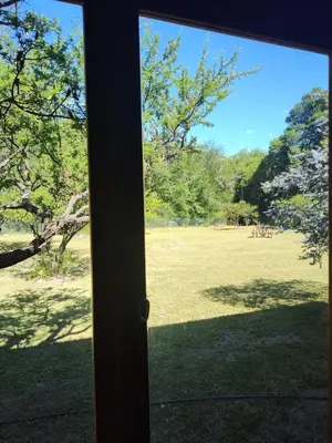 a view of a field from a window at El Espinillo, Casa de Campo in Santa Rosa de Calamuchita