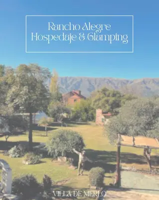 a view of a park with a giraffe and trees at GLAMPING RANCHO ALEGRE in Merlo