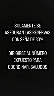 a sign with the names of a number on a black background at CABAÑA PRIVADA NALÚ in Villa Ciudad Parque