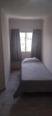 a bedroom with a bed and a window at DEPARTAMENTO VILLA CARLOS PAZ CENTRO in Villa Carlos Paz