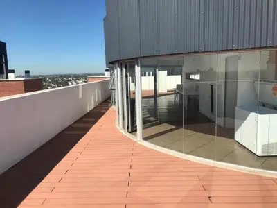 a balcony of a building with a table on it at Vista Privilegiada in Cordoba