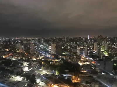 a view of a city at night with lights at Vista Privilegiada in Cordoba