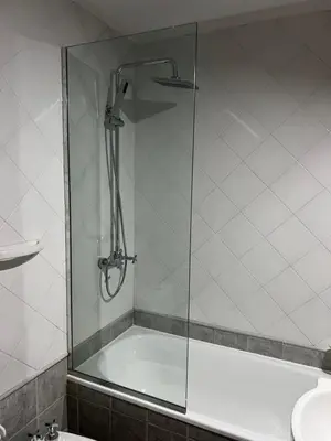 a shower with a glass door in a bathroom at SUPER UBICACIÓN NUEVA CÓRDOBA in Cordoba