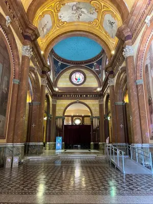 a large building with a ceiling with paintings on it at SUPER UBICACIÓN NUEVA CÓRDOBA in Cordoba