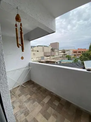 an empty balcony with a view of a city at Departamento 2 dormitorios Villa Carlos Paz in Villa Carlos Paz