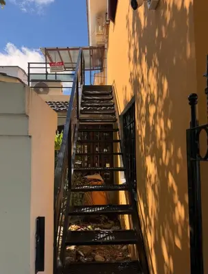 a set of stairs leading up to a building at Dpto Santa Rosa in Santa Rosa de Calamuchita