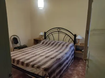 a bedroom with a bed in a room at Casa en Carlos Paz in Villa Carlos Paz